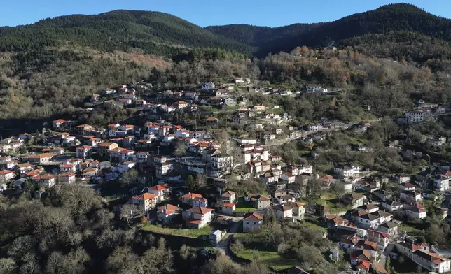 Fourna village stands in central Greece, Monday, Nov. 25, 2024. (AP Photo/Thanassis Stavrakis)