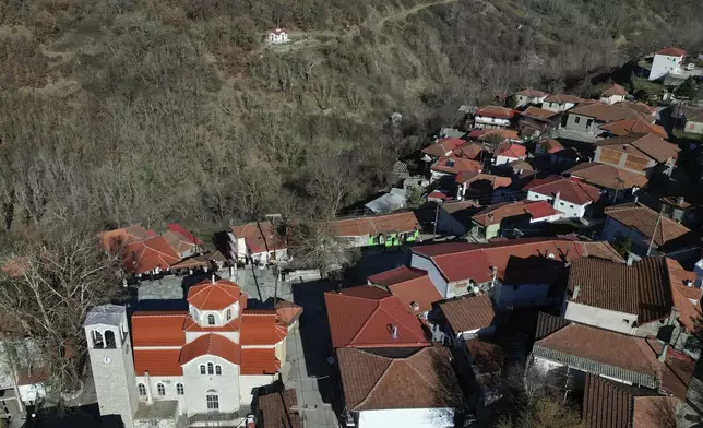 Fourna village stands in central Greece, Monday, Nov. 25, 2024. (AP Photo/Thanassis Stavrakis)