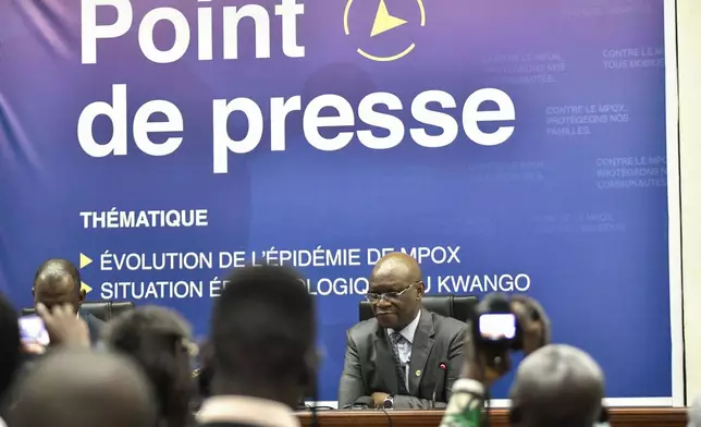 Congo's Health Minister Roger Kamba speaks, during a press conference, in Congo, Kinshasa, Thursday, Nov 5, 2024. (AP Photo/Samy Ntumba Shambuyi)