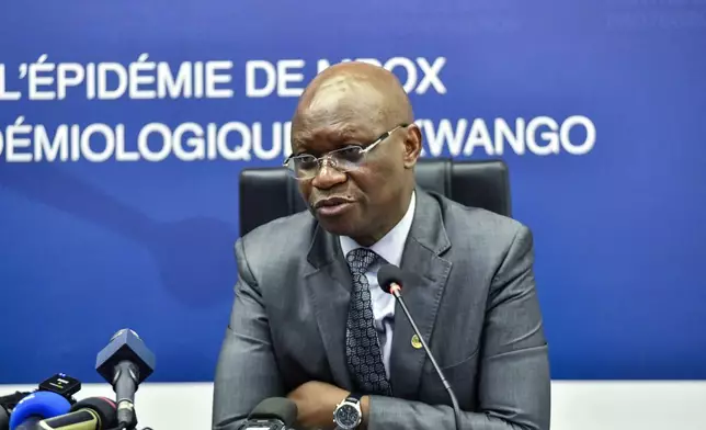 Congo's Health Minister Roger Kamba speaks, during a press conference, in Congo, Kinshasa, Thursday, Nov 5, 2024. (AP Photo/Samy Ntumba Shambuyi)