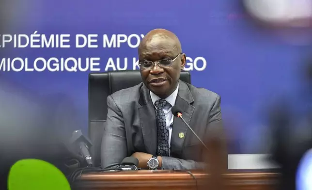 Congo's health minister Roger Kamba attends a press conference in Kinshasa, Congo, Thursday, Dec. 5, 2024. (AP Photo/Samy Ntumba Shambuyi)