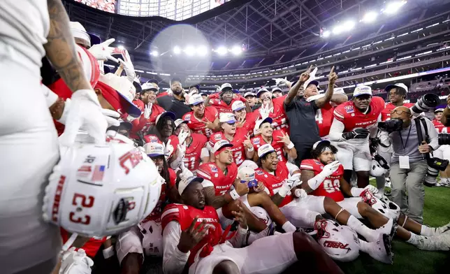 UNLV celebrates after the team's win against California during the LA Bowl NCAA college football game Wednesday, Dec. 18, 2024, in Inglewood, Calif. (AP Photo/Ryan Sun)