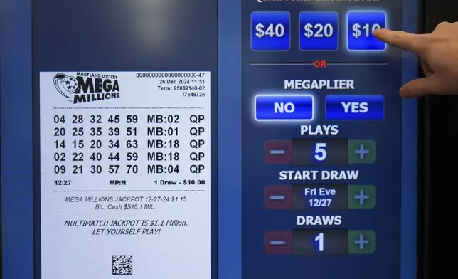 A digital Mega Millions ticket is seen on a screen as a person makes their selections on a self-serve terminal inside a gas station ahead of Friday's Mega Millions drawing of $1.15 billion, Thursday, Dec. 26, 2024, in Baltimore. (AP Photo/Stephanie Scarbrough)