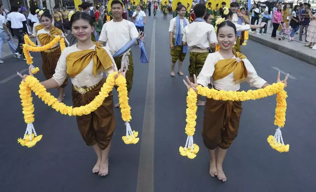 Cambodian dancers perform during the "Celebrating Cambodia" event as part of the New Year's Eve in front of Royal Palace in Phnom Penh, Cambodia, Tuesday Dec. 31, 2024. (AP Photo/Heng Sinith)