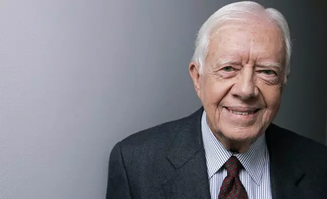 FILE - Former President Jimmy Carter poses for a portrait during the Toronto International Film Festival, Sept. 10, 2007, in Toronto. (AP Photo/Carolyn Kaster, File)