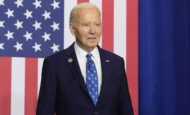 President Joe Biden arrives to speak at the Department of Labor in Washington, Monday, Dec. 16, 2024. (AP Photo/Ben Curtis)