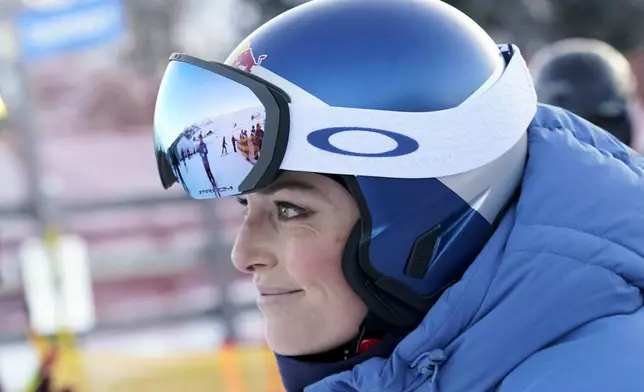 United States' Lindsey Vonn looks on before competing in an alpine ski, women's World Cup super G, in St. Moritz, Switzerland, Saturday, Dec. 21, 2024. (AP Photo/Giovanni Auletta)