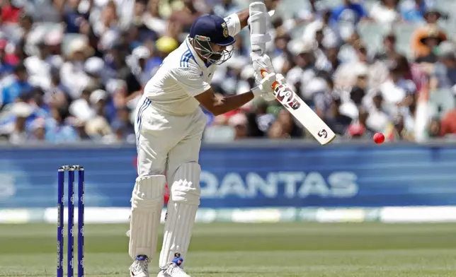 India's Ravichandran Ashwin plays a shot during the day three of the second cricket test match between Australia and India at the Adelaide Oval in Adelaide, Australia, Sunday, Dec. 8, 2024. (AP Photo/James Elsby)