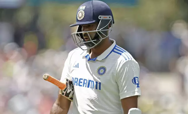 India's Ravichandran Ashwin walks off the field after losing his wicket during the day three of the second cricket test match between Australia and India at the Adelaide Oval in Adelaide, Australia, Sunday, Dec. 8, 2024. (AP Photo/James Elsby)