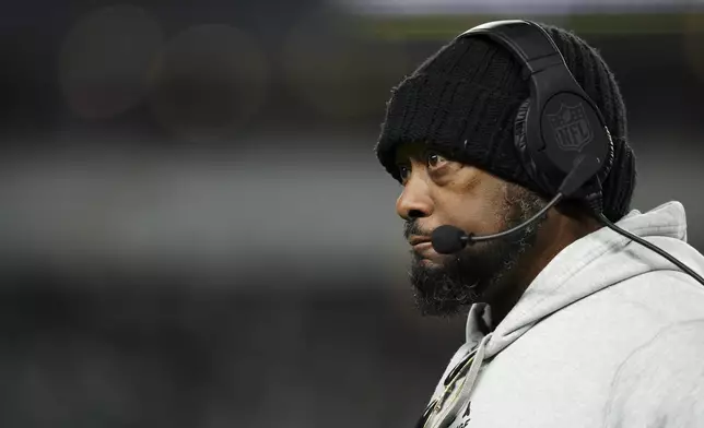 Pittsburgh Steelers head coach Mike Tomlin watches action during the first half of an NFL football game against the Philadelphia Eagles on Sunday, Dec. 15, 2024, in Philadelphia. (AP Photo/Derik Hamilton)