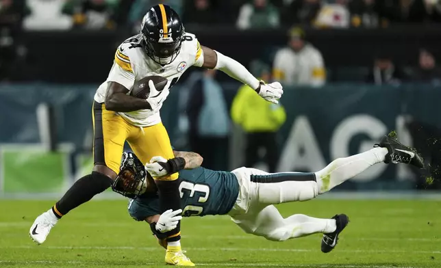 Pittsburgh Steelers running back Cordarrelle Patterson (84) is tackled by Philadelphia Eagles linebacker Zack Baun (53) during the second half of an NFL football game Sunday, Dec. 15, 2024, in Philadelphia. (AP Photo/Derik Hamilton)