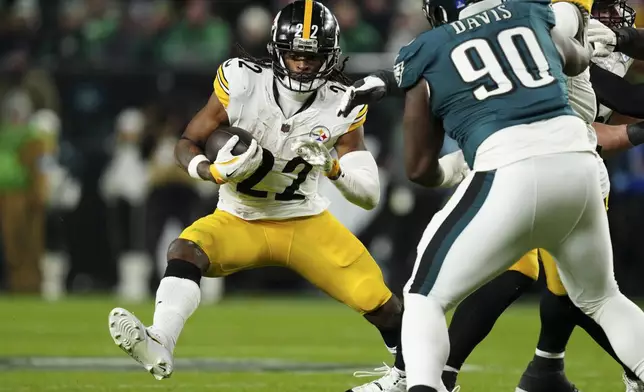 Pittsburgh Steelers' Najee Harris (22) runs with the ball during the second half of an NFL football game against the Philadelphia Eagles on Sunday, Dec. 15, 2024, in Philadelphia. (AP Photo/Derik Hamilton)