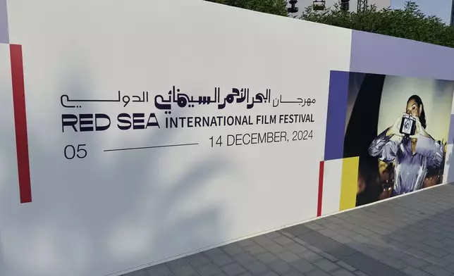 A view of the Red Sea International Film Festival banner displayed in Jeddah, Saudi Arabia, Thursday, Dec. 5, 2024. (AP Photo/Baraa Anwer)