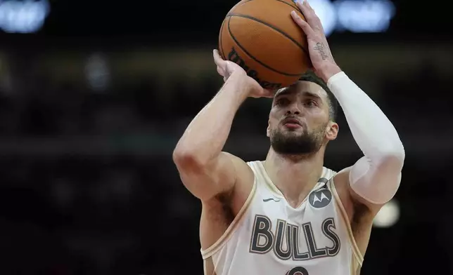 Chicago Bulls guard Zach LaVine takes a free throw during the second half of an NBA basketball game against the Milwaukee Bucks, Saturday, Dec. 28, 2024, in Chicago. (AP Photo/Erin Hooley)