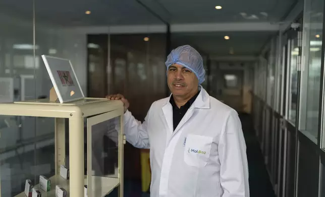 Abdeladim Moumem, founder and Chief Scientific Officer of Moldiag, poses for a portrait while producing mpox tests, in Tamesna, Morocco, Thursday, Nov. 28, 2024. (AP Photo/Mosa'ab Elshamy)