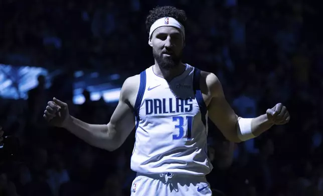 Dallas Mavericks guard Klay Thompson stands on the court before an NBA basketball game against the Golden State Warriors, Sunday, Dec. 15, 2024, in San Francisco. (AP Photo/Benjamin Fanjoy)