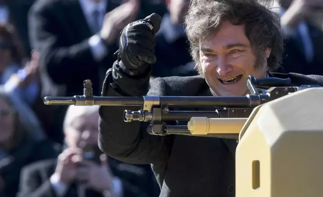 FILE - Argentine President Javier Milei stands on an armored tank during a military parade celebrating Independence Day in Buenos Aires, Argentina, July 9, 2024. (AP Photo/Gustavo Garello, File)