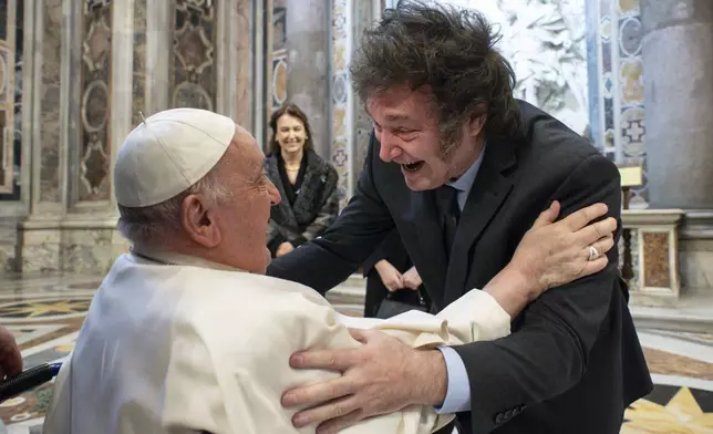 FILE - Argentine President Javier Milei greets Pope Francis prior to the start of the canonization Mass of Argentine first female saint, María Antonia de Paz y Figueroa also known as "Mama Antula", in St. Peter's Basilica at The Vatican, Feb. 11, 2024. (Vatican Media via AP, File)