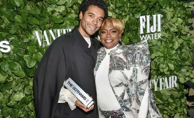 Actor Brandon Wilson poses with the breakthrough performer award for "Nickel Boys" and actor Aunjanue Ellis-Taylor during The Gothams Film Awards at Cipriani Wall Street on Monday, Dec. 2, 2024, in New York. (Photo by Evan Agostini/Invision/AP)
