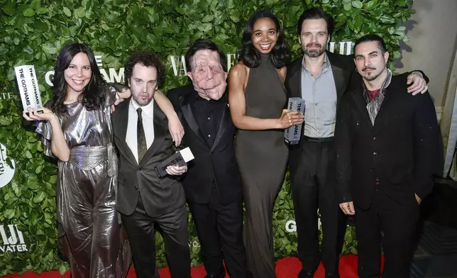 From left, Vanessa McDonnell, Aaron Schimberg, Adam Pearson, Gabriel Mayers, Sebastian Stan and Mike Marino pose with the best feature award for "A Different Man" during The Gothams Film Awards at Cipriani Wall Street on Monday, Dec. 2, 2024, in New York. (Photo by Evan Agostini/Invision/AP)