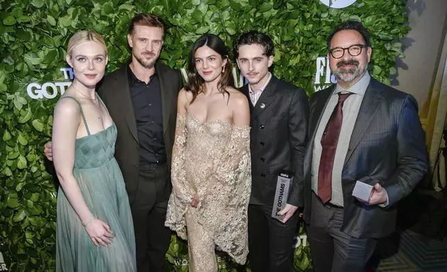 Elle Fanning, from left, Boyd Holbrook and Monica Barbaro pose with honorees Timothee Chalamet and James Mangold with their visionary tribute awards for "A Complete Unknown" during The Gothams Film Awards at Cipriani Wall Street on Monday, Dec. 2, 2024, in New York. (Photo by Evan Agostini/Invision/AP)