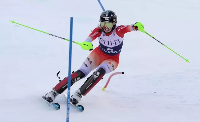 Camille Rast, of Switzerland, competes during a women's World Cup slalom skiing race, Sunday, Dec. 1, 2024, in Killington, Vt. (AP Photo/Robert F. Bukaty)