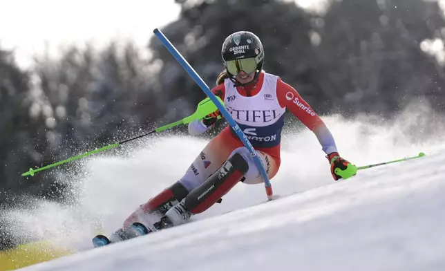 Camille Rast, of Switzerland, competes during a women's World Cup slalom skiing race, Sunday, Dec. 1, 2024, in Killington, Vt. (AP Photo/Robert F. Bukaty)