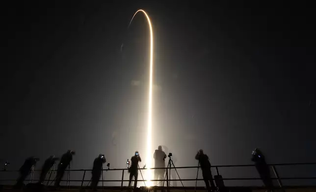 A SpaceX Falcon 9 rocket lifts off in this time-exposure photo, from Launch Pad 39A Sunday, March 3, 2024, at the Kennedy Space Center in Cape Canaveral, Fla. (AP Photo/Chris O'Meara)