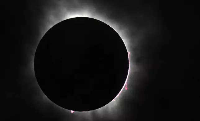 The moon covers the sun during a total solar eclipse, as seen from Fort Worth, Texas, Monday, April 8, 2024. (AP Photo/LM Otero)