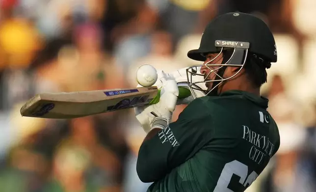 Pakistan's Saim Ayub plays a shot during the second T20 International cricket match between South Africa and Pakistan, at Centurion Park in Centurion, South Africa, Friday, Dec. 13, 2024. (AP Photo/Themba Hadebe)