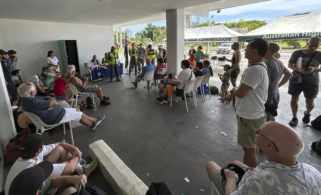 Australian citizen's are briefed on evacuation plans in Port Vila, Thursday, Dec. 19, 2024, following a magnitude 7.3 earthquake that struck off the coast of Vanuatu in the South Pacific Ocean, Tuesday, Dec. 17. (DFAT via AP)