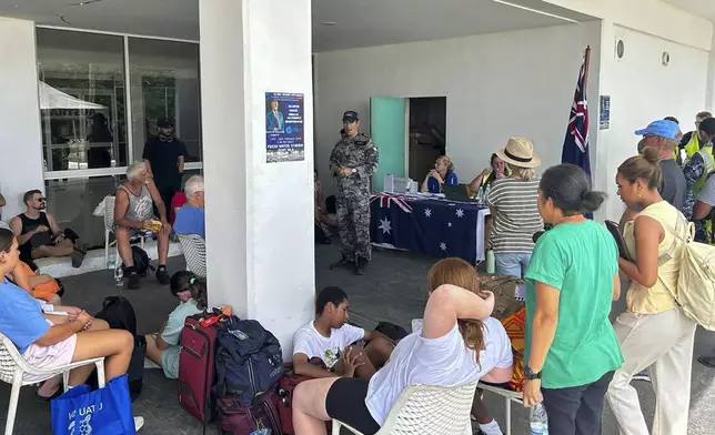 Australian citizen's are briefed on evacuation plans in Port Vila, Thursday, Dec. 19, 2024, following a magnitude 7.3 earthquake that struck off the coast of Vanuatu in the South Pacific Ocean, Tuesday, Dec. 17. (DFAT via AP)