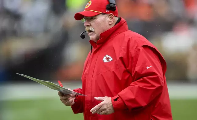 Kansas City Chiefs head coach Andy Reid watches play against the Cleveland Browns during the first half of an NFL football game, Sunday, Dec. 15, 2024, in Cleveland. (AP Photo/David Richard)