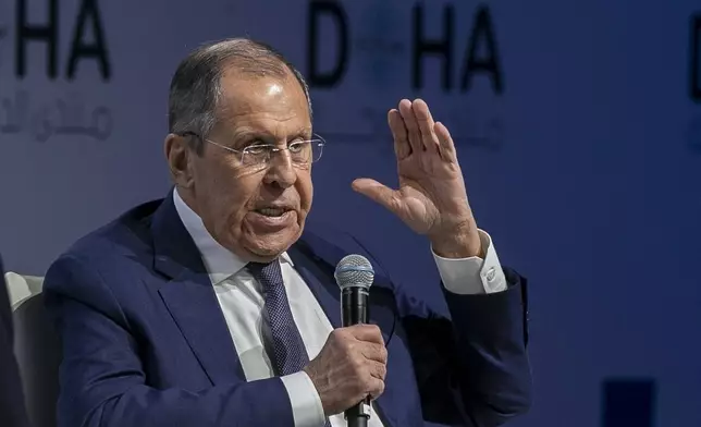 Russian Foreign Minister Sergey Lavrov gestures as he speaks at the Doha Forum in Doha, Qatar, on Saturday Dec. 7, 2024. (AP Photo/Hussein Sayed)