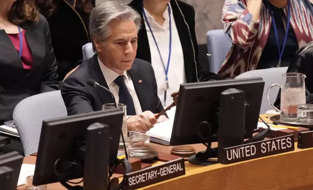 U.S. Secretary of State Antony Blinken gavels the meeting open as President of the United Nations Security Council, Thursday, Dec. 19, 2024. (AP Photo/Richard Drew)