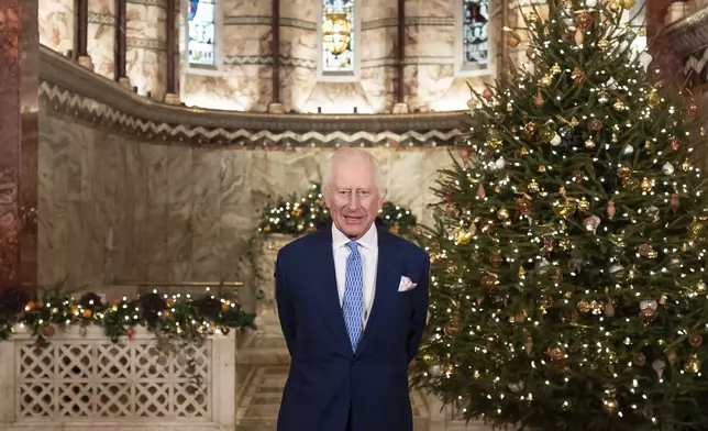 Britain's King Charles III speaks during the recording of his Christmas message at the Fitzrovia Chapel in central London, England, Wednesday, Dec. 11, 2024. (Aaron Chown/PA via AP, Pool)