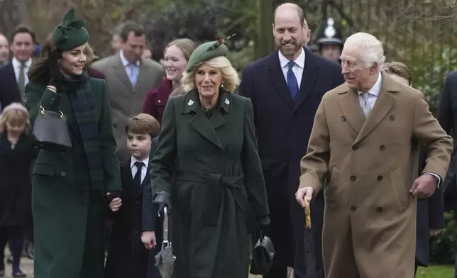 Britain's King Charles III, right, with Queen Camilla, centre, and Kate Princess of Wales, left, Prince Louis, and Prince William walk as they go to the Christmas day service at St Mary Magdalene Church in Sandringham in Norfolk, England, Wednesday, Dec. 25, 2024. (AP Photo/Jon Super)