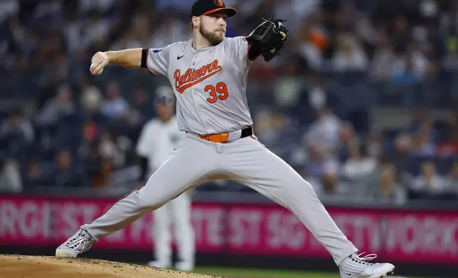 FILE - Baltimore Orioles' Corbin Burnes pitches during the first inning of a baseball game against New York Yankees, Thursday, Sept. 26, 2024, in New York. (AP Photo/Noah K. Murray, File)