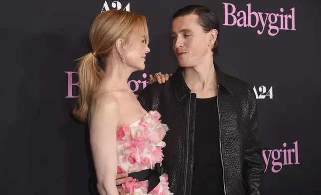 Nicole Kidman, left, and Harris Dickinson arrive at the premiere of "Babygirl" on Wednesday, Dec. 11, 2024, at the DGA Theater in Los Angeles. (Photo by Richard Shotwell/Invision/AP)