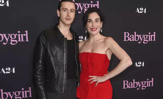 Harris Dickinson, left, and Halina Reijn arrive at the premiere of "Babygirl" on Wednesday, Dec. 11, 2024, at the DGA Theater in Los Angeles. (Photo by Richard Shotwell/Invision/AP)