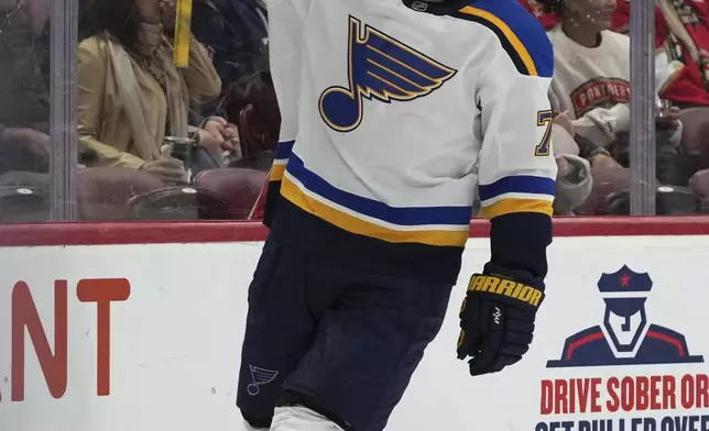 St. Louis Blues center Oskar Sundqvist reacts after scoring during the first period of an NHL hockey game against the Florida Panthers, Friday, Dec. 20, 2024, in Sunrise, Fla. (AP Photo/Lynne Sladky)