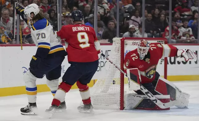 St. Louis Blues center Oskar Sundqvist (70) reacts after scoring a goal against Florida Panthers goaltender Sergei Bobrovsky (72) during the first period of an NHL hockey game, Friday, Dec. 20, 2024, in Sunrise, Fla. (AP Photo/Lynne Sladky)