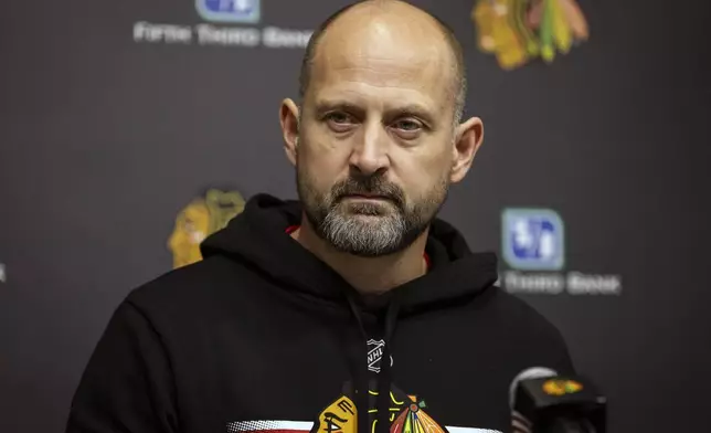 Chicago Blackhawks interim head coach Anders Sorensen speaks with reporters after NHL hockey practice at Fifth Third Arena, Friday, Dec. 6, 2024. (Ashlee Rezin/Chicago Sun-Times via AP)