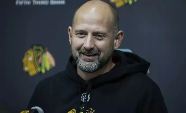 Chicago Blackhawks interim head coach Anders Sorensen speaks with reporters after NHL hockey practice at Fifth Third Arena, Friday, Dec. 6, 2024. (Ashlee Rezin/Chicago Sun-Times via AP)