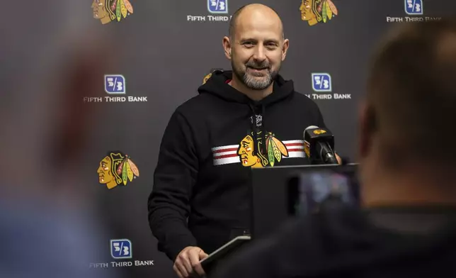 Chicago Blackhawks interim head coach Anders Sorensen speaks with reporters after NHL hockey practice at Fifth Third Arena, Friday, Dec. 6, 2024. (Ashlee Rezin/Chicago Sun-Times via AP)