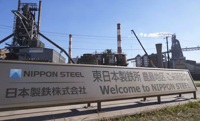 'Welcome to Nippon Steel' sign in front of Blast Furnace No. 1 at Nippon Steel's Kashima Plant in Kashima, Japan on Friday, Dec. 6, 2024. (AP Photo/Ayaka McGill)
