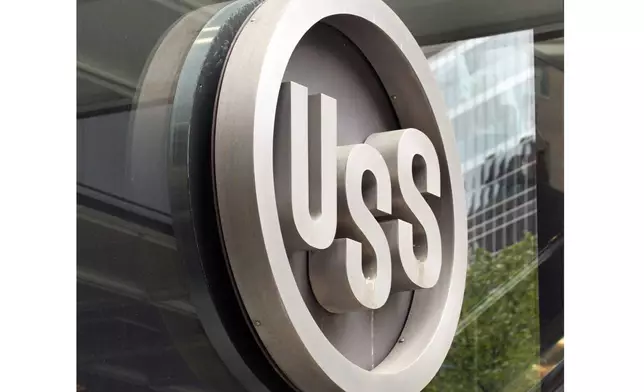 FILE - This April 26, 2010, file photo shows the United States Steel logo outside the headquarters building in downtown Pittsburgh. President-elect Donald Trump is underscoring his intention to block the purchase of U.S. Steel by Japanese steelmaker Nippon Steel Corp., and he’s pledging to use tax incentives and tariffs to strengthen the iconic American steelmaker. Trump said during the campaign that he would “instantaneously” block the deal, and he reiterated that sentiment in a Monday night statement.(AP Photo/Gene J. Puskar, File)