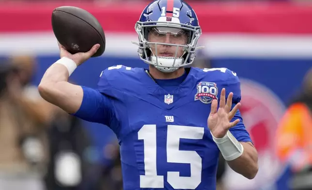 New York Giants quarterback Tommy DeVito (15) passes against the Baltimore Ravens during the first quarter of an NFL football game, Sunday, Dec. 15, 2024, in East Rutherford, N.J. (AP Photo/Frank Franklin II)