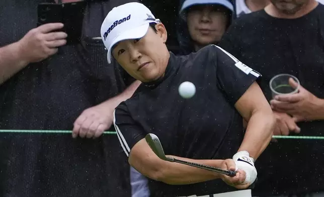 Jiyai Shin of Korea chips onto the 16th green during the final round of the Australian Open golf championship at the Kingston Heath Golf Club in Melbourne, Australia, Sunday, Dec. 1, 2024. (AP Photo/Asanka Brendon Ratnayake)