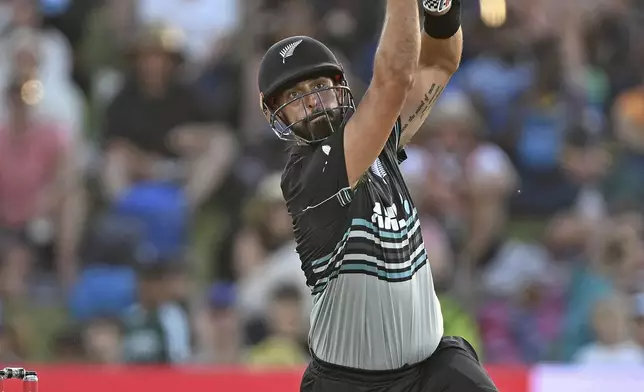New Zealand's Daryl Mitchell bats during the first Twenty20 international cricket match between New Zealand and Sri Lanka at Mt Maunganui, New Zealand on Saturday, Dec. 28, 2024. (Andrew Cornaga/Photosport via AP)